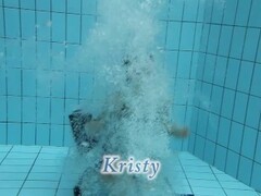 Brunette Kristy stripping underwater Thumb