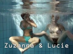 Zuzanna and Lucie playing underwater Thumb