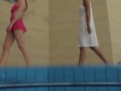 Two girls swim naked underwater Thumb