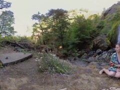 Watch hottie brunette Calliope masturbating at the waterfall Thumb
