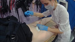 Medical fetish sounding in straitjacket Thumb