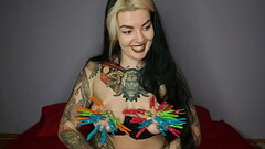 Tattooed, kinky girl hangs the maximum number of clothespins on her big tits Thumb