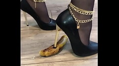 I put on my high heels and crush a banana in them Thumb