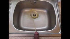 Pissing in the Sink Thumb