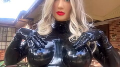 Living Rubber Doll Playing with Big Latex Boobs Thumb