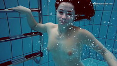 Big tits teenie Liza Bubarek swimming naked in the pool Thumb