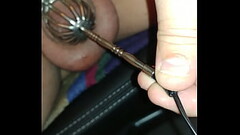 probe in a caged penis Thumb