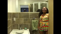 Ebony chick in white fishnet stockings pissing in the toilet and filming Thumb