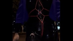 Walk on street with electric shock in latex Thumb