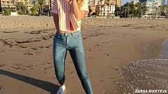 Wet shoot on a public beach with Crazy Model. Risky outdoor masturbation. Foot fetish. Pee in jeans. Thumb